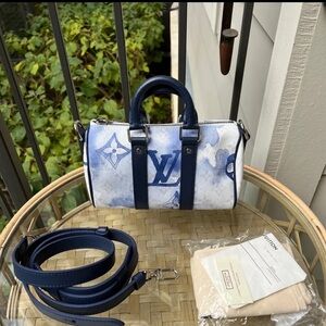 LV Louis Vuittion Keepall Bandouliere Bag Limited Edition Monogram Watercolor.